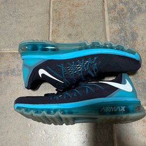 Likely worn multi color blue Nike air maxs
